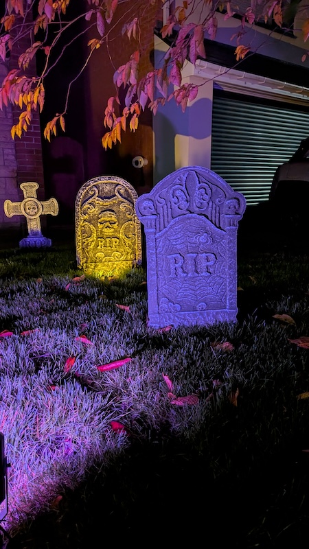 Close-up view of the illuminated gravestones.